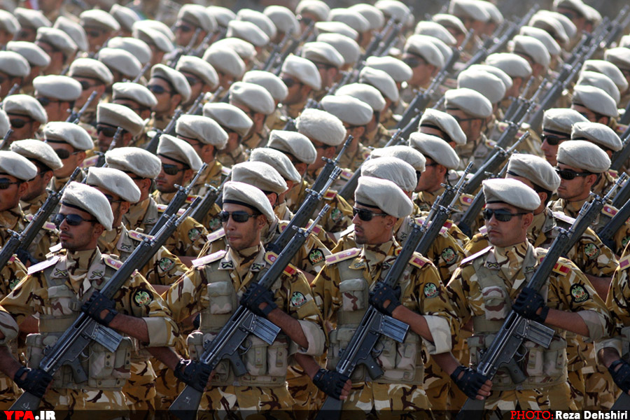 Islamic Republic of Iran Army soldiers marching in front of highest-ranking commanders of Armed Forces of the Islamic Republic of Iran during Sacred Defence Week parade.
