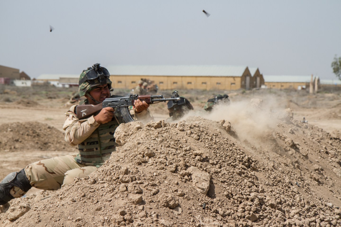 Iraqi soldiers trained with members of the 3rd Brigade Combat Team, 82nd Airborne Division, at Camp Taji, Iraq. The 3rd Bde., 82nd Abn. Div., was deployed to Iraq as part of Combined Joint Task Force - Operation Inherent Resolve to advise and assist Iraqi Security Forces in their fight against the Islamic State of Iraq and the Levant. Iraqi soldiers learned tactics and techniques from U.S. Soldiers during a six-week basic training course, and more complicated tactics during a three-week advanced training course. (U.S. Army photo by Sgt. Cody Quinn, CJTF - OIR Public Affairs)
