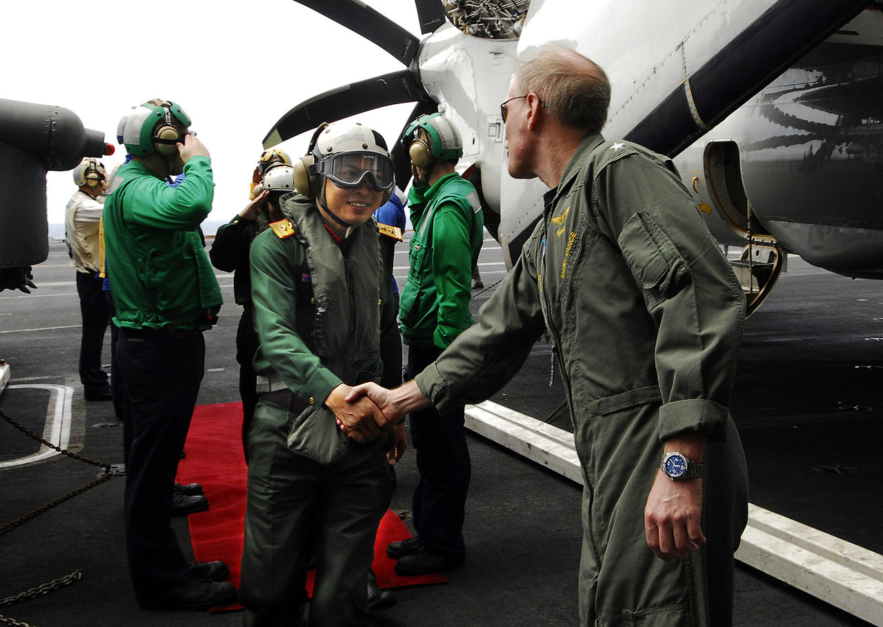 PACIFIC OCEAN (April 22, 2009) Rear Adm. Mark Vance, commander, Carrier Strike Group Three, welcomes Senior Col. Do Minh Tuan, Deputy Chief of Staff for the Vietnam People's Armed Forces Air Defense Force, aboard the aircraft carrier USS John C. Stennis (CVN 74). Stennis and Carrier Air Wing (CVW) 9 are on a scheduled six-month deployment to the western Pacific Ocean