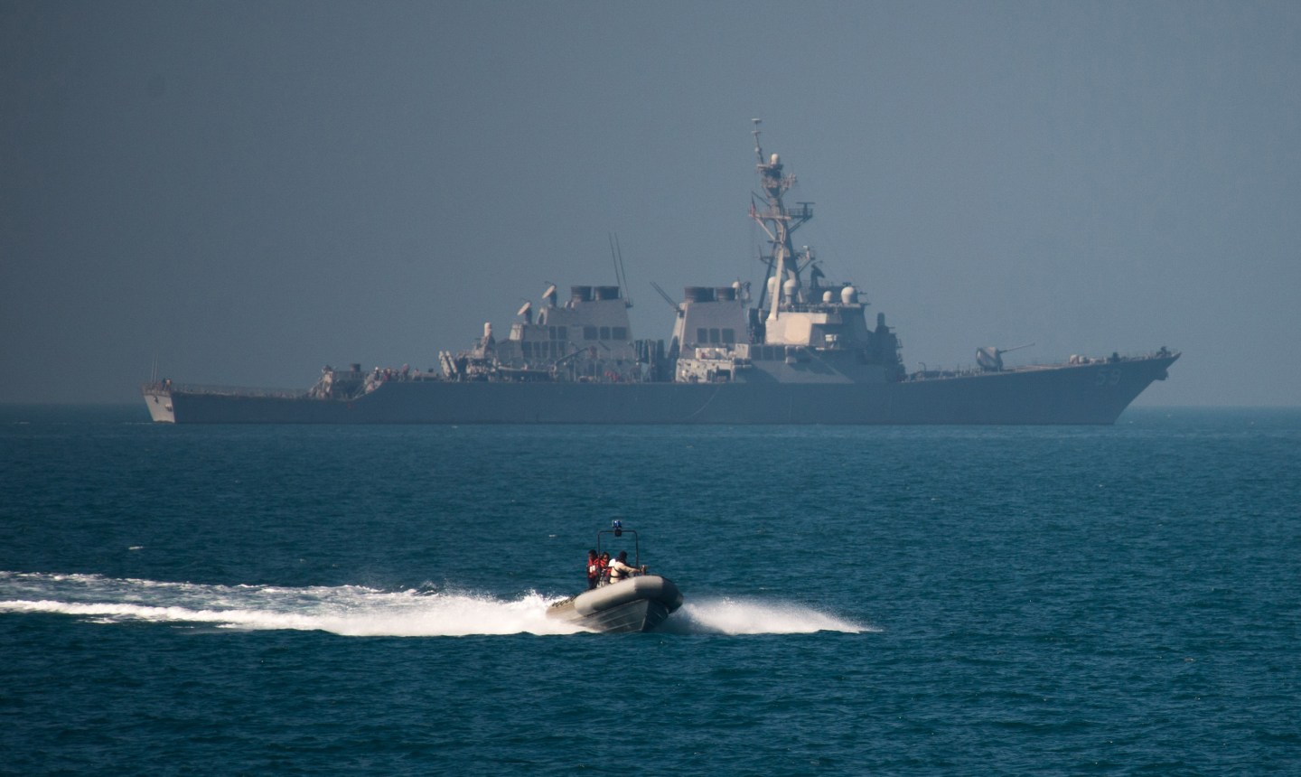 A ridged hull inflatable boat, launched from the Raleigh Burke-class guided-missile destroyer USS Russell (DDG 59), participates in a monthly Iraqi bilateral exercise. The Iraqi bilateral is a monthly exercise with U.S. Navy, U.S. Coast Guard, and the Iraqi navy. The U.S. participates in bilateral exercises with partner nations in order to build and strengthen solid partnerships throughout the region. Commander, Task Force 55 controls surface forces including U.S. Navy coastal patrol craft and U.S Coast Guard patrols boats in the U.S. 5th Fleet area of operations. (U.S. Navy Combat Camera photo by Mass Communication Specialist 2nd Class Torrey W. Lee/Released)160214-N-CJ186-187