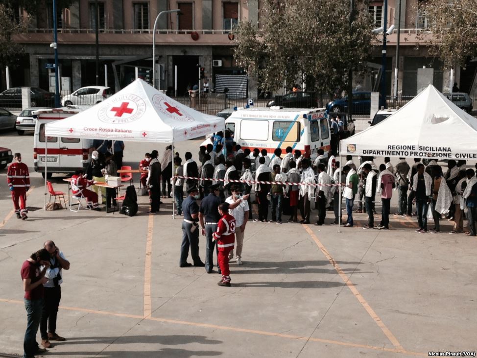 Eritrean migrants arrive in Messina.